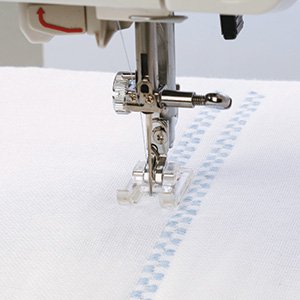 Prensatelas de zig zag artesano